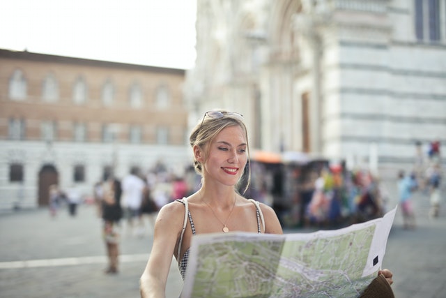 A woman looking at the map