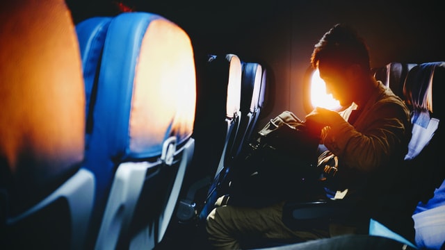 a man sitting on the plane.