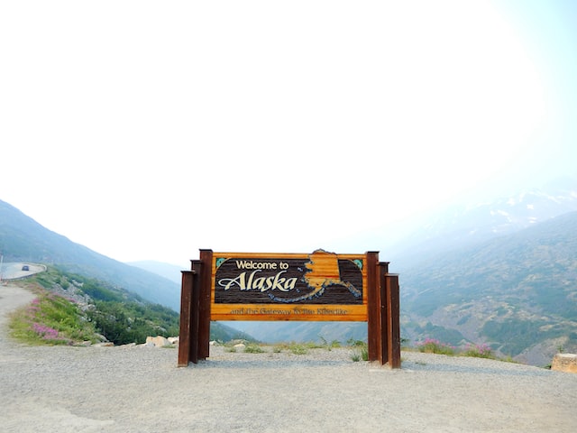 A sign saying 'Welcome to Alaska' to those who wish to visit Alaska this summer.